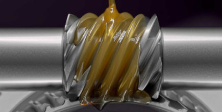 An auto component being lubricated