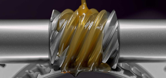 An auto component being lubricated