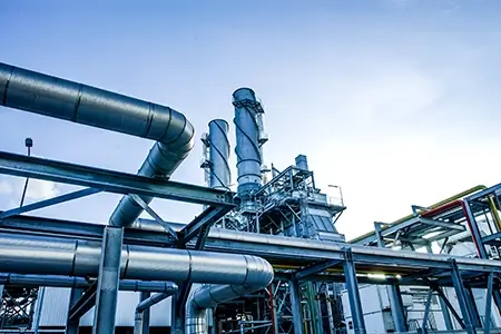 Industrial view at oil refinery plant form industry zone with cloudy sky